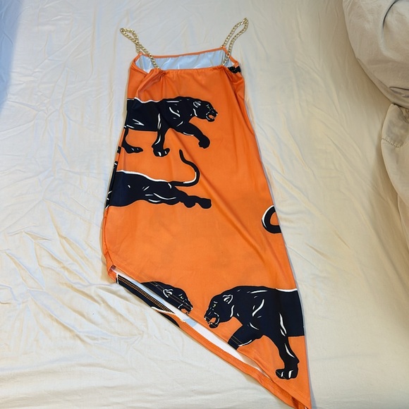 Orange and black printed dress with gold chain straps. Size medium - Picture 2 of 4